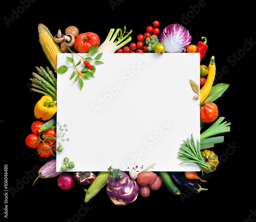 Fototapeta Naklejka Na Ścianę i Meble -  Healthy food background and Copy space. Studio photography of white paper surrounded by fresh vegetables  isolated on black background, top view. High resolution product
