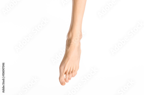 Pedicure and foot care topic: the naked man's legs isolated on white background in studio © Parad St