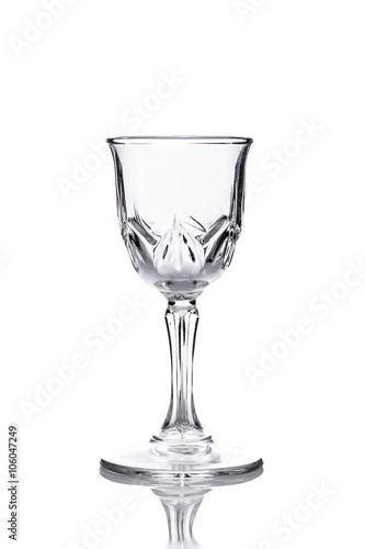the glass of vodka on white background