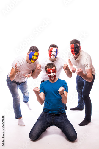 Group of football fans support their national team at camera on white background. European 2016 football fans concept.