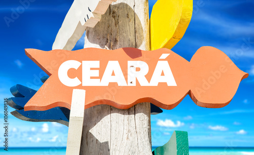 Ceara signpost with beach background photo
