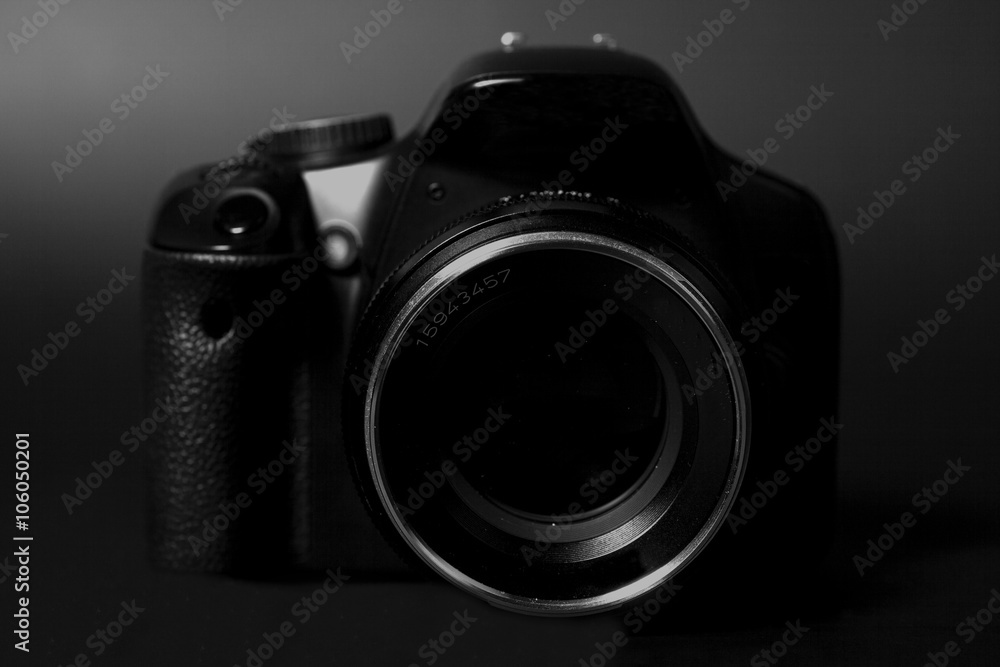 Professional modern DSLR camera with  aperture lens