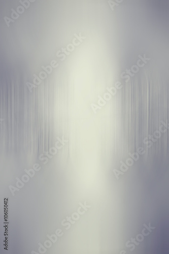 blurred dark gray gradient background with vertical stripes