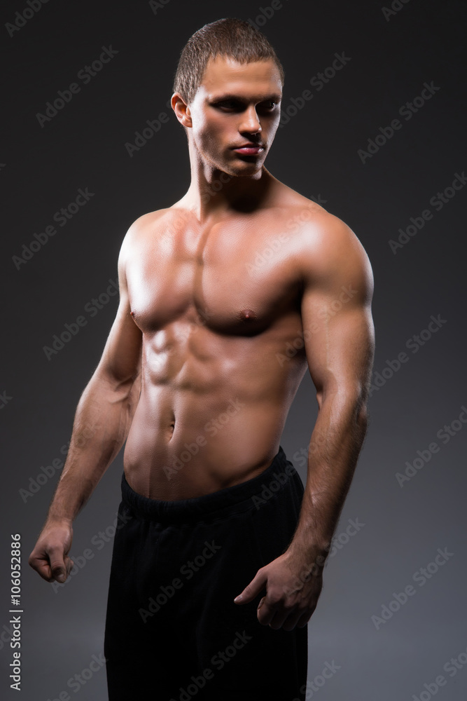 Strong, fit and sporty bodybuilder man