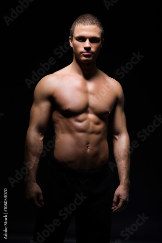 Strong, fit and sporty bodybuilder man