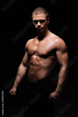 Strong, fit and sporty bodybuilder man