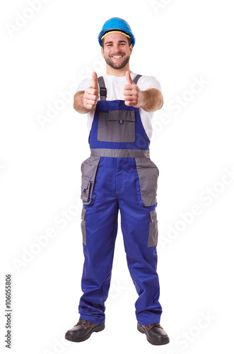 Manual worker makes a gesture thumbs up