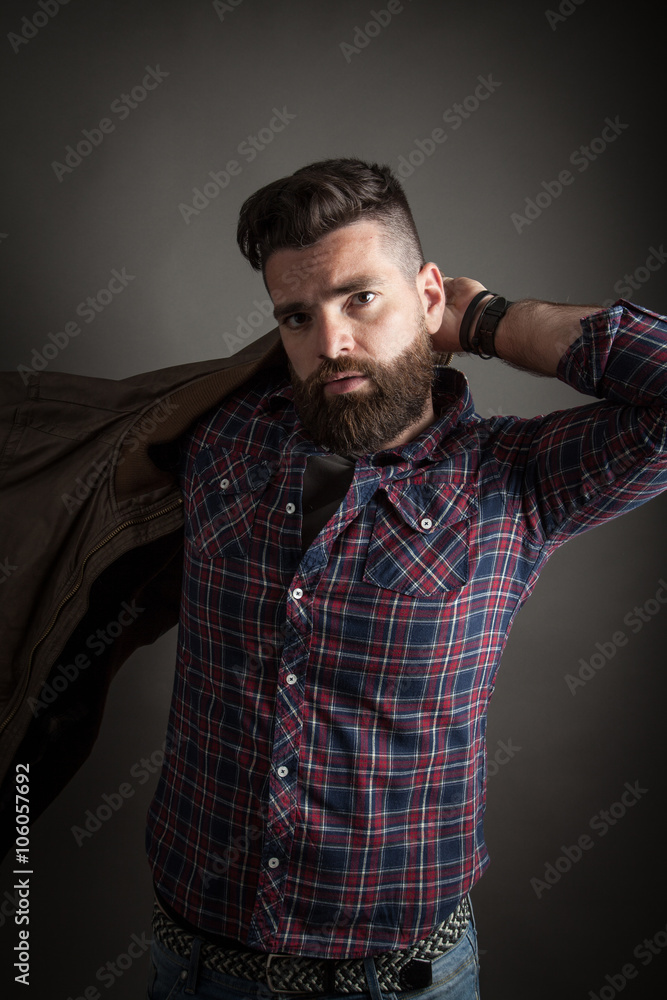Young handsome hipster with beard Young handsome hipster with beard