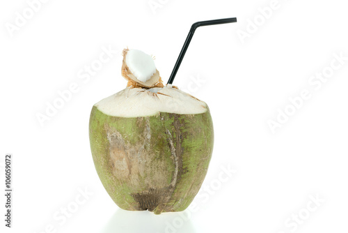 Opened green coconut with straw, isolated on white background. Food or fruit object concept
