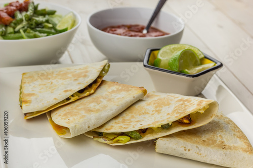 Mexican quesadillas with chicken, green beans salsa and salad