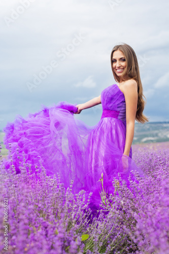 Woman is wearing fashion dress at lavender field