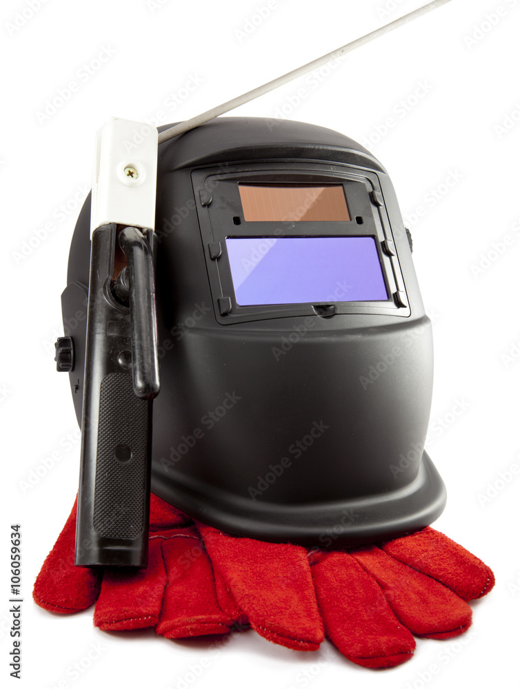 Fototapeta premium Protective welder mask, electrode and gloves on a white background