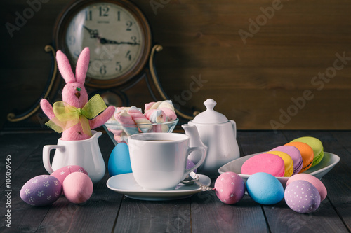 Easter kid breakfst with colored macaroon photo