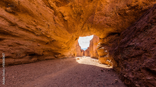 Tall Arch at Death Valley. Wind and water did the bridge between the rocks. Natural bridge canyon trail, Death Valley