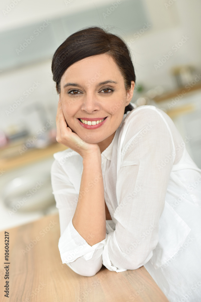 Portrait of attractive 40-year-old woman at home