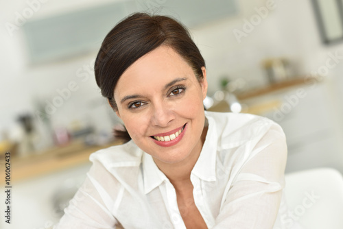 Portrait of attractive 40-year-old woman at home