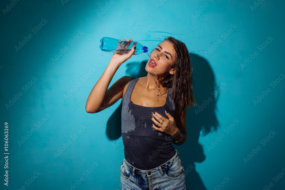 sexy girl pours water from a bottle , pours itself , vechekle , positive sexy girl pours water from a bottle , pours itself , vechekle , positive