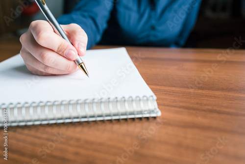 Wallpaper Mural Девушка пишет в пустой тетради ручкой Torontodigital.ca