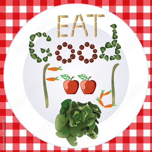 Plate with health food with tomatos, apples, carrot and salad on red checkered tablecloth