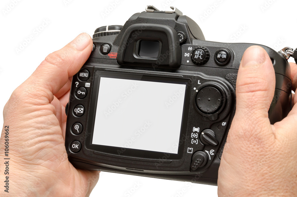 Isolated camera in hands. Isolated white screen for mockup. Isolated camera in hands. Isolated white screen for mockup.