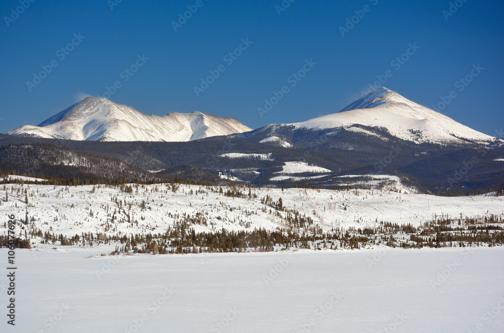 Two Snow Covered Mountain Peaks on Dillon Reservoir in Colorado on a Cold Winter Day
