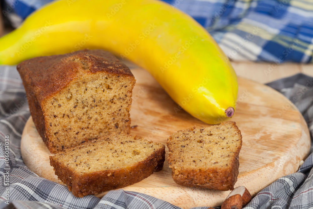 Homemade banana bread sliced on a table . rustic style Homemade banana bread sliced on a table . rustic style