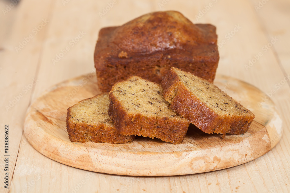 Homemade banana bread sliced on a table . rustic style Homemade banana bread sliced on a table . rustic style