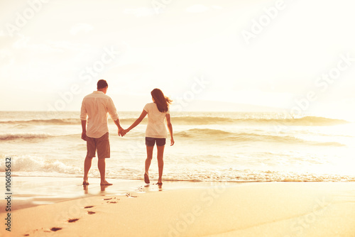 Romantic Couple on the Beach at Sunset.