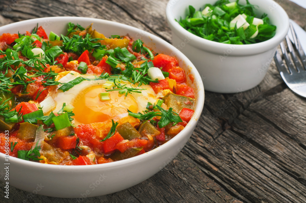 Shakshuka with tomatoes and eggs Shakshuka with tomatoes and eggs