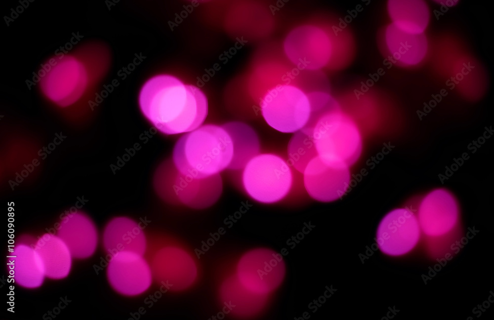 Pink bokeh on dark background Pink bokeh on dark background