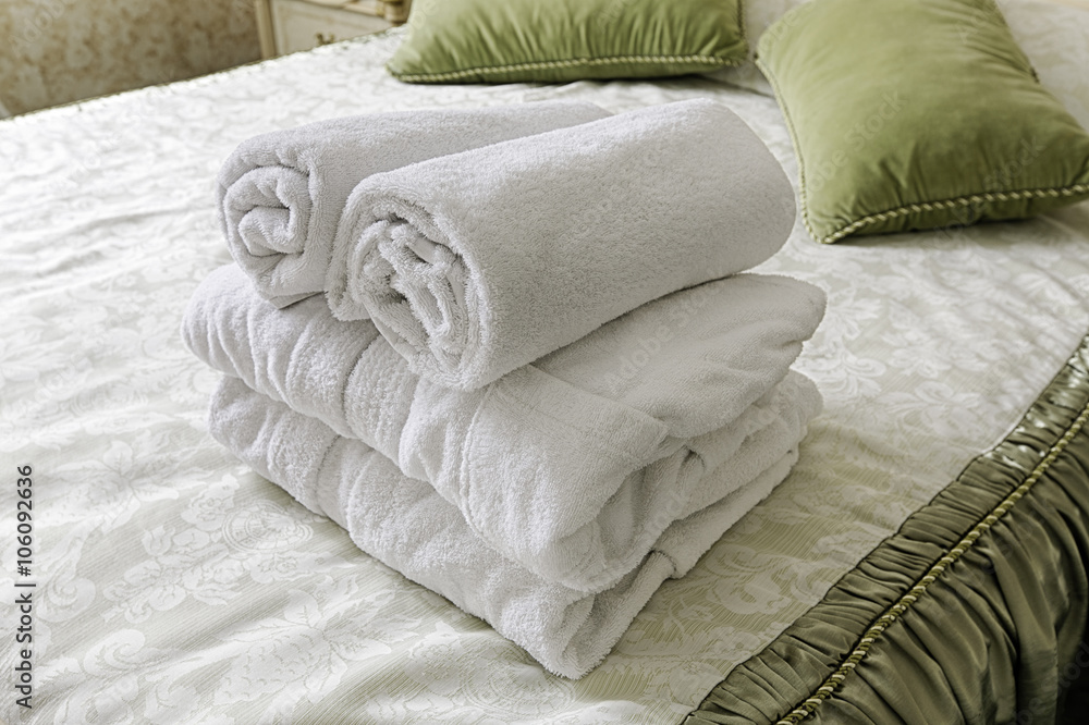 Towel in Hotel bedoom. Welcome guests room service Towel in Hotel bedoom. Welcome guests room service