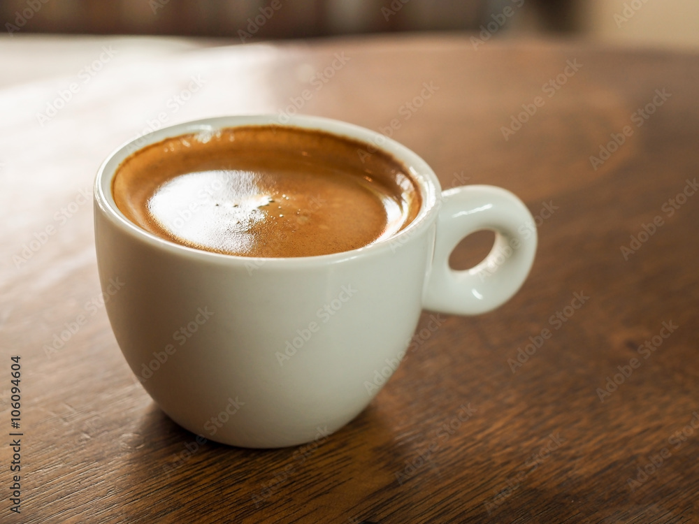 Cup of hot espresso coffee on wood table Cup of hot espresso coffee on wood table