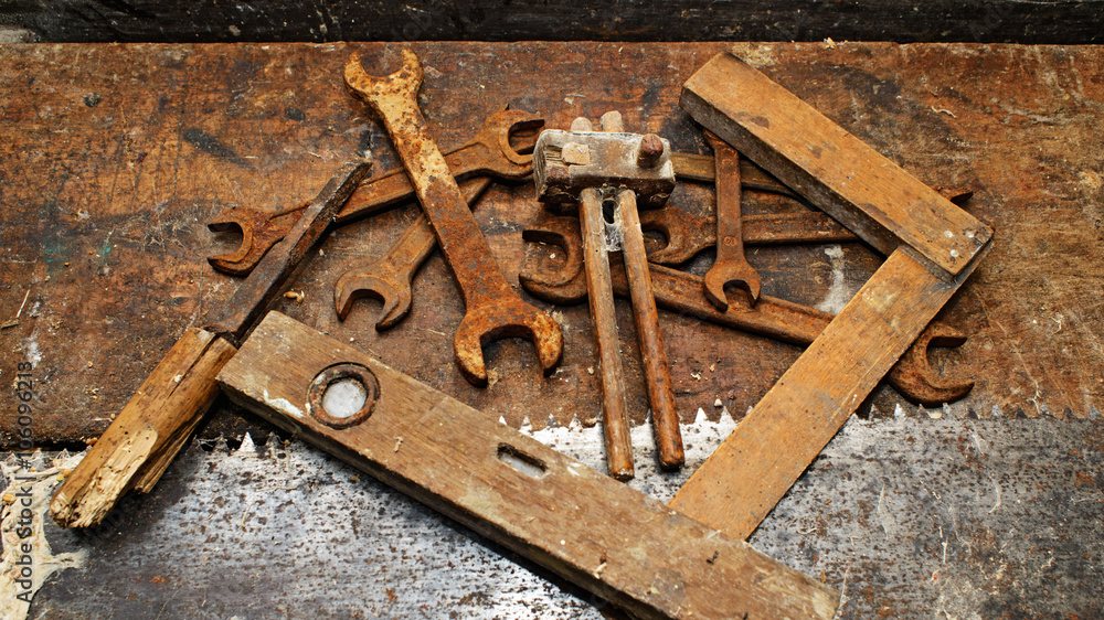 Old woodworking tools on dirty wooden table Old woodworking tools on dirty wooden table