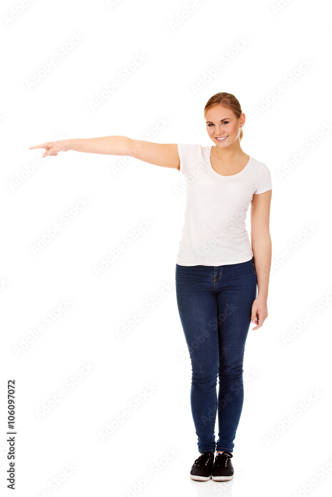Student woman showing copyspace or something Student woman showing copyspace or something