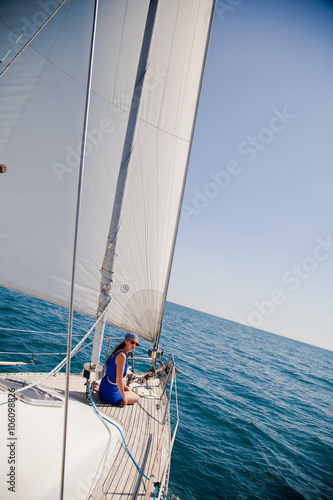 young girl on the white yacht