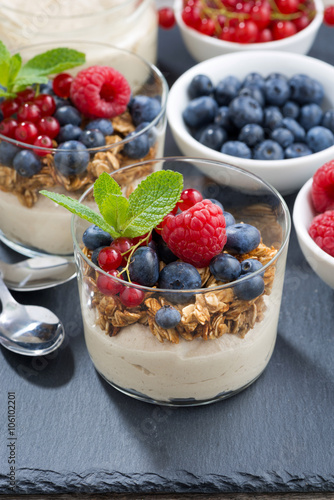 dessert with sweet  milk cream, fresh berries and muesli