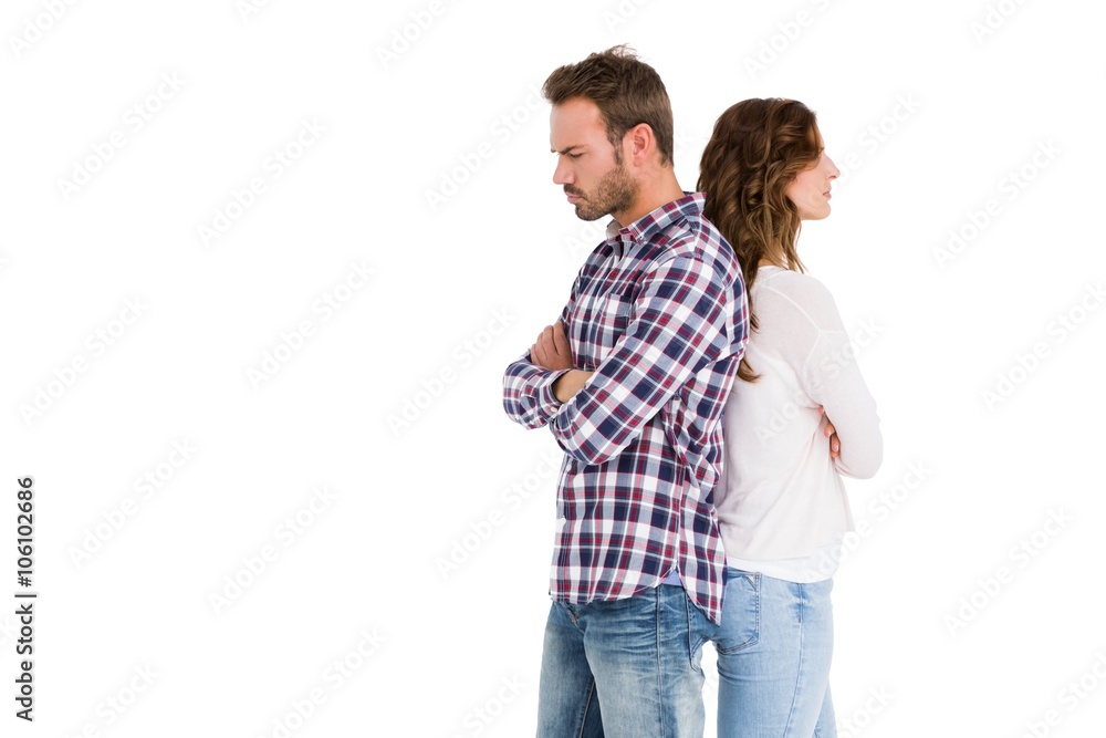 Depressed couple standing back to back 