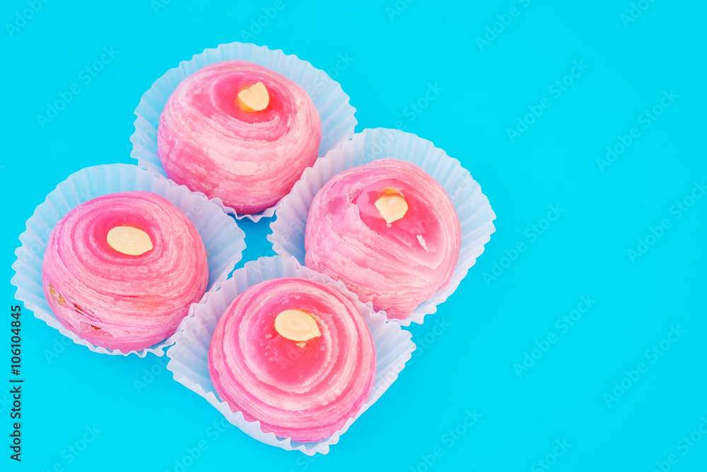 Dessert called 'Pia' or Mung bean filling cake, Pink bean and eg Dessert called 'Pia' or Mung bean filling cake, Pink bean and eg
