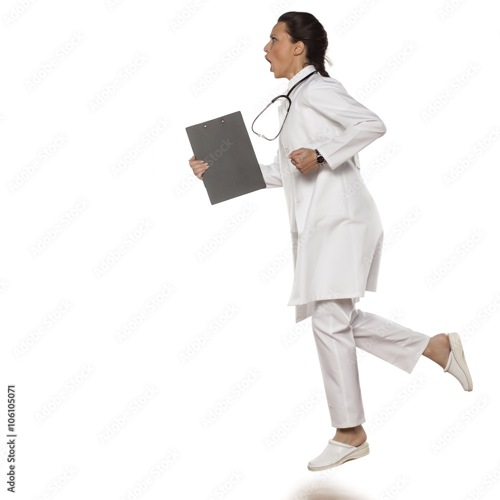 beautiful woman doctor in uniform running with clipboard in her hand beautiful woman doctor in uniform running with clipboard in her hand