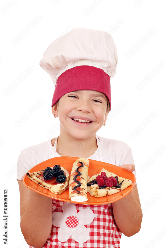 happy little girl cook with crepes on plate happy little girl cook with crepes on plate