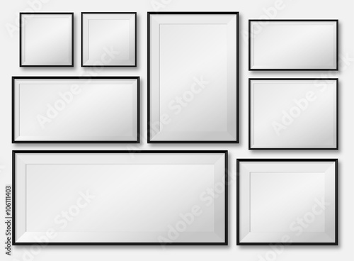 blank picture frame template set isolated on wall