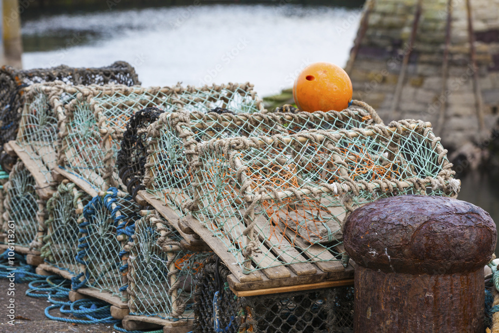 Mesh net shellfish traps at sea port