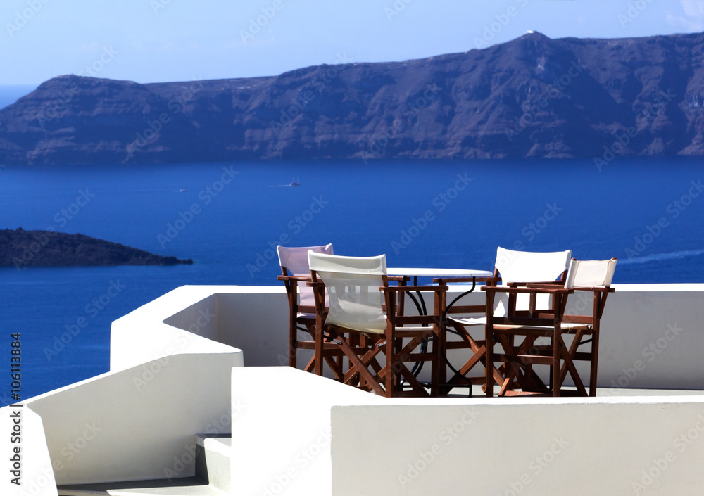 restaurant on the top of Santorini island overlooking at Aegean