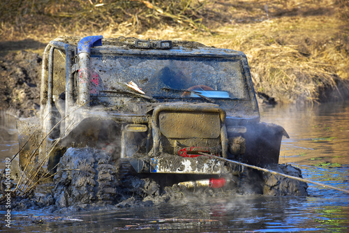 Extreme of-road car in mud crossing
