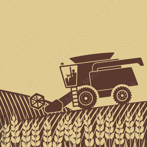 combine harvester in field