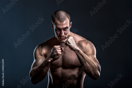 Canvastavla tough muscular powerful male fighter portrait