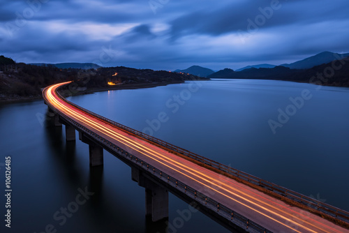 Fototapeta Naklejka Na Ścianę i Meble -  Traffic lights.
Night view of the bridge over the Tzonevo lake, Bulgaria.