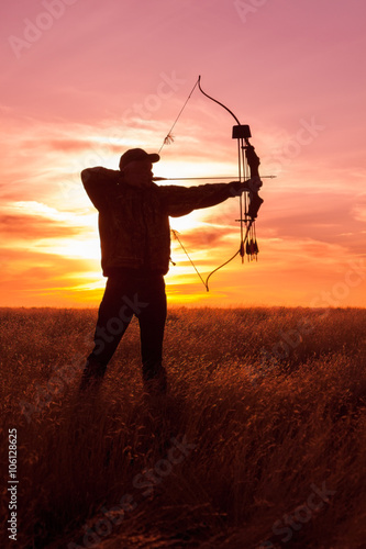 Bowhunter at Sunset