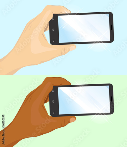 hand of caucasian and african american man holding black horizontal smartphone