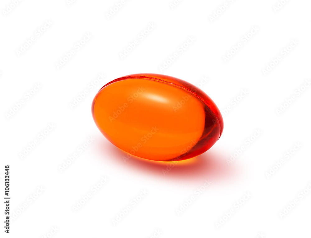 Red transparent supplement capsule isolated on white background Red transparent supplement capsule isolated on white background